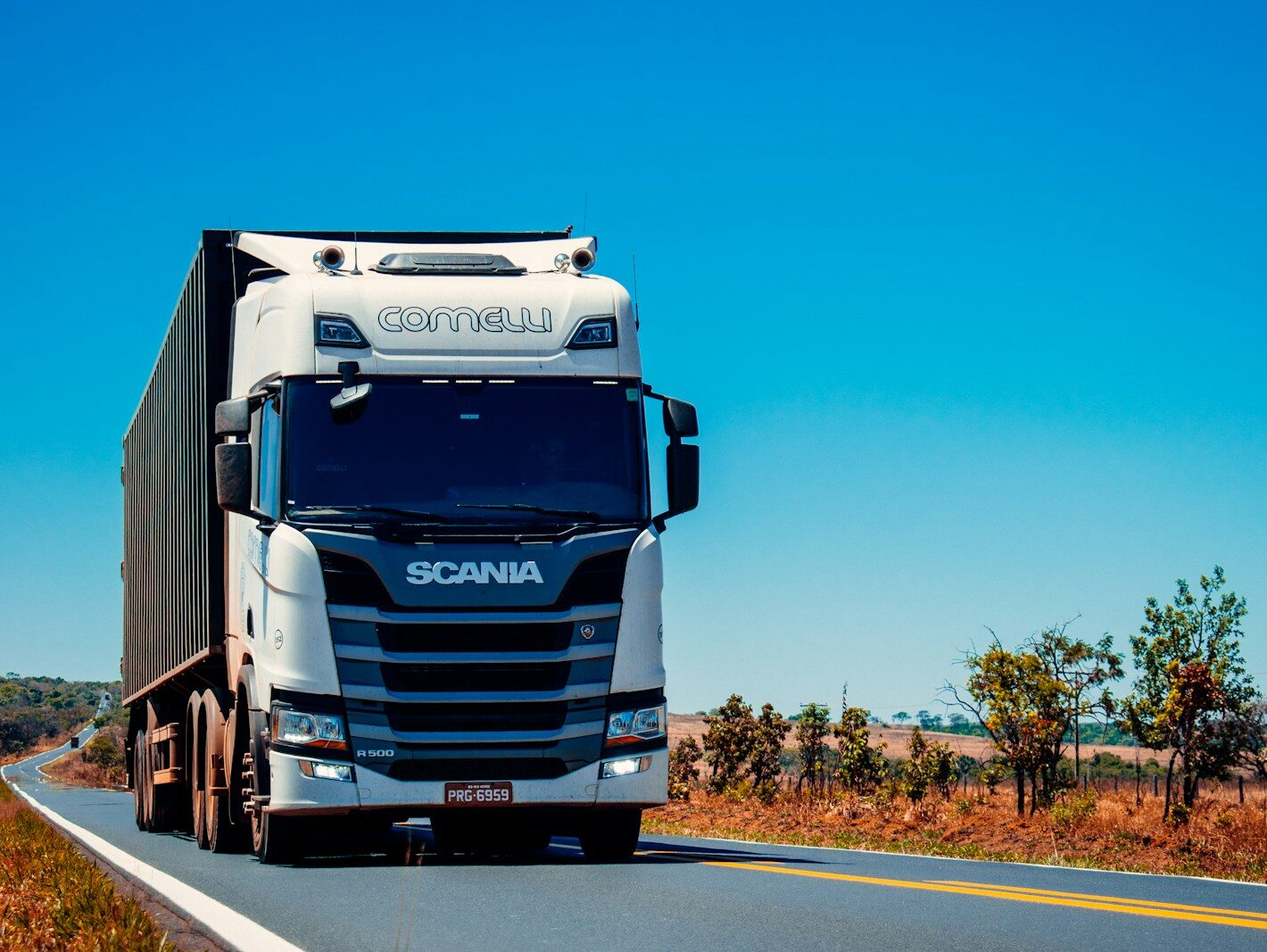 white truck on road during daytime